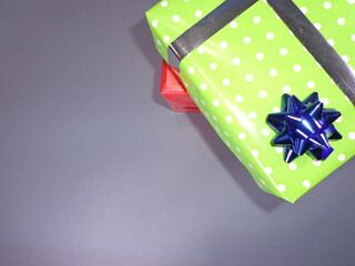 Well decorated gifts on colored backgrounds