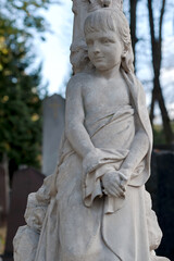 Obraz na płótnie Canvas Tomb sculpture of a girl at Lychakiv cemetery in Lviv, Ukraine