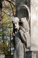 Fototapeta na wymiar Tomb sculpture of Jesus Christ with lamb at Lychakiv cemetery in Lviv, Ukraine