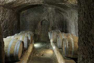 eight wooden barrles in the cellar of a syngoge in Pitigliano