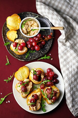 Selective focus. Macro. Canapes with pate and grapes. Healthy snack. Christmas food.