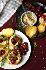 Selective focus. Macro. Canapes with pate and grapes. Healthy snack. Christmas food.