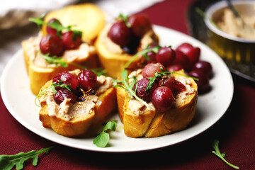 Selective focus. Macro. Canapes with pate and grapes. Healthy snack. Christmas food.