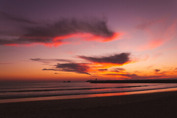 Fototapeta na wymiar sunset on the beach in the Atlantic ocean Viana do Castelo Praia do Cabedelo Cabedelo beach colorful clouds