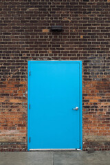 Blue door on brick