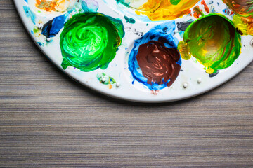 Acrylic paint on an artist's plastic paint palette