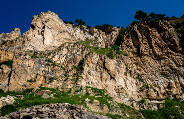 Fototapeta na wymiar Stones on the slopes of the Avakas mountain gorge on the island of Cyprus.