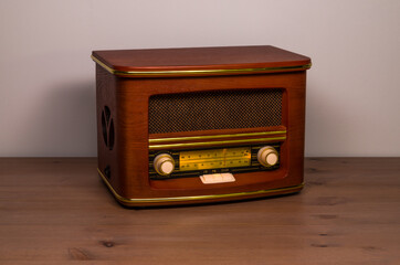 Vintage radio on wooden table
