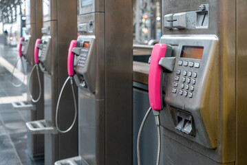 public telephone speaker in a row