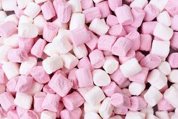 Marshmallow sweets pastel background, colorful confectionary card, selective focus, toned