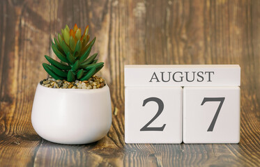 Flower pot and calendar for the warm season from 27 August. Summer time.