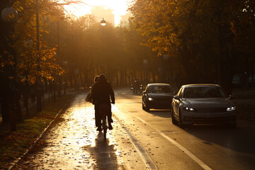 People riding bicycle in city street