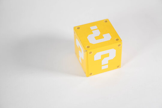 metal toy blocks with a question mark	
