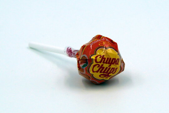 Amsterdam, The Netherlands - Januari 26, 2018: Orange flavor Chupa Chups lollipop. 