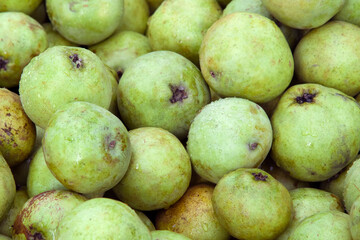 Top view of ripe green pears. Organic garden fruit. Harvest and healthy food concept.