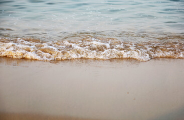 Beautiful soft wave sea and sand in the morning at Pattaya, Thailand.
