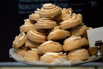Delicious swirling biscuit cookies on a showcase in a cafe.