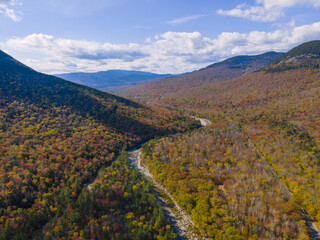 Aerial view of Pemigewasset River valley with fall foliage near Lincoln Woods on Kancamagus Highway in White Mountain National Forest, Town of Lincoln, New Hampshire NH, USA.
