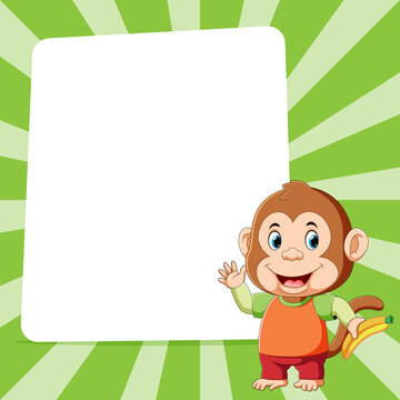 The Monkey Holding Banana Standing In Front Of The Blank White Board