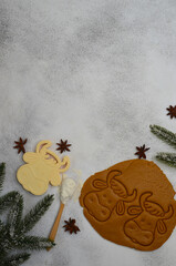 making homemade cookies from dough in the shape of the symbol of the year cow or bull, home hobby during quarantine baking concept