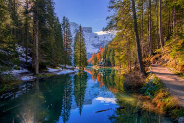 The beautiful Braies lake in late autumn with a little snow, Pearl of the Dolomite lakes is an UNESCO heritage and is located in the Braies Alto Adige,Italy