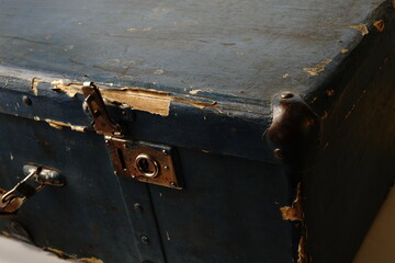 An old suitcase about 40 years of the 19th century. Dark blue color and protected corners with metal inserts. Two locks. Big.