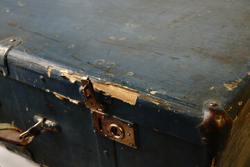 An old suitcase about 40 years of the 19th century. Dark blue color and protected corners with metal inserts. Two locks. Big.