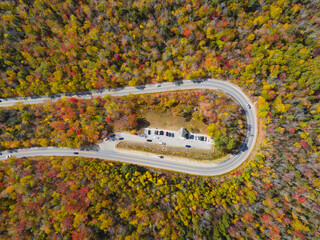 White Mountain National Forest fall foliage on Kancamagus Highway near Hancock Notch u-turn top view, Town of Lincoln, New Hampshire NH, USA.