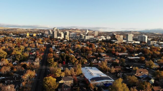 Reno nv tilt down to area around community and housing with downtown background