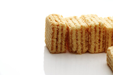Lemon cream cube wafer on white background