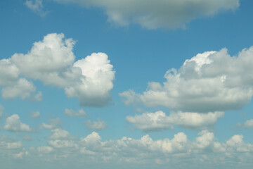 Naklejka na ściany i meble White clouds with blue sky in summer seasonal.