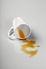 Fototapeta na wymiar Spilled coffee cup
