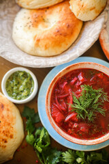 Chickpea soup. Moroccan traditional dish. Wooden background. Close up.