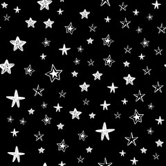 hand drawn stars seamless pattern. Doodle star texture. Sky and night background.