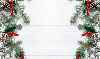 Fototapeta na wymiar New Year and christmas banner of fir branches and cones on a white wooden background. Winter holidays concept. Flat lay, top view, copy space.