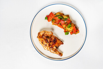 chicken with roasted vegetables on the white