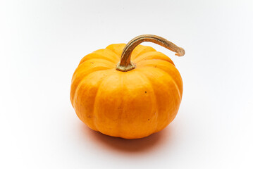 small decorative pumpkins on the white background
