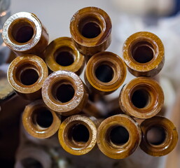 The ends of the tubes of pressed paper, varnished closeup
