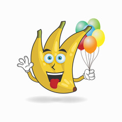 Banana mascot character holding a balloon. vector illustration