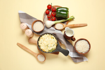 Baking dish with tasty rice casserole on color background