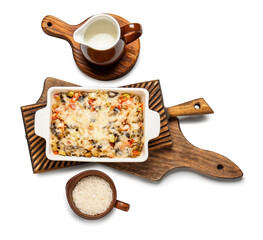 Baking dish with tasty rice casserole on white background