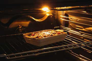 Cooking of rice casserole in oven