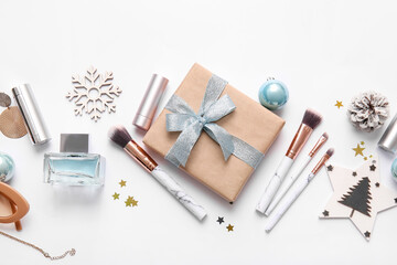 New Year composition with makeup cosmetics on white background