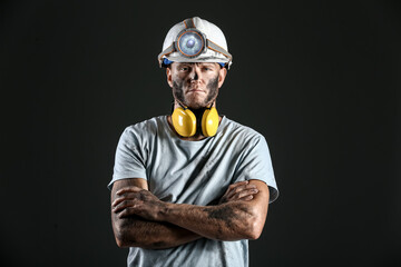 Miner man on dark background