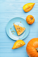 Composition with tasty cut pumpkin pie on wooden background