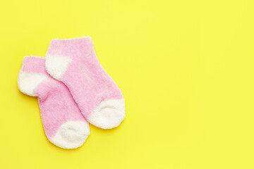 Warm socks on color background