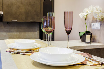 served table in interior of modern luxure guest room in studio apartments in minimalistic style