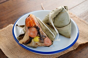 Zongzi or rice dumplings on the table (Chinese dragon boat festival)