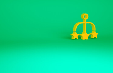 Orange Baby crib hanging toys icon isolated on green background. Baby bed carousel. Minimalism concept. 3d illustration 3D render.