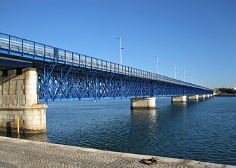 Railway bridge crossing the Arade river in Portimao, Algarve - Portugal 
